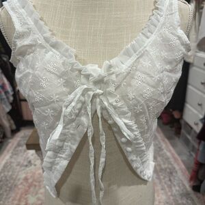 Sheer White Lace Top with V-neckline and Bow Detail